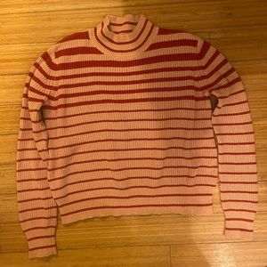 Stylish, warm sweater with pink and red stripes